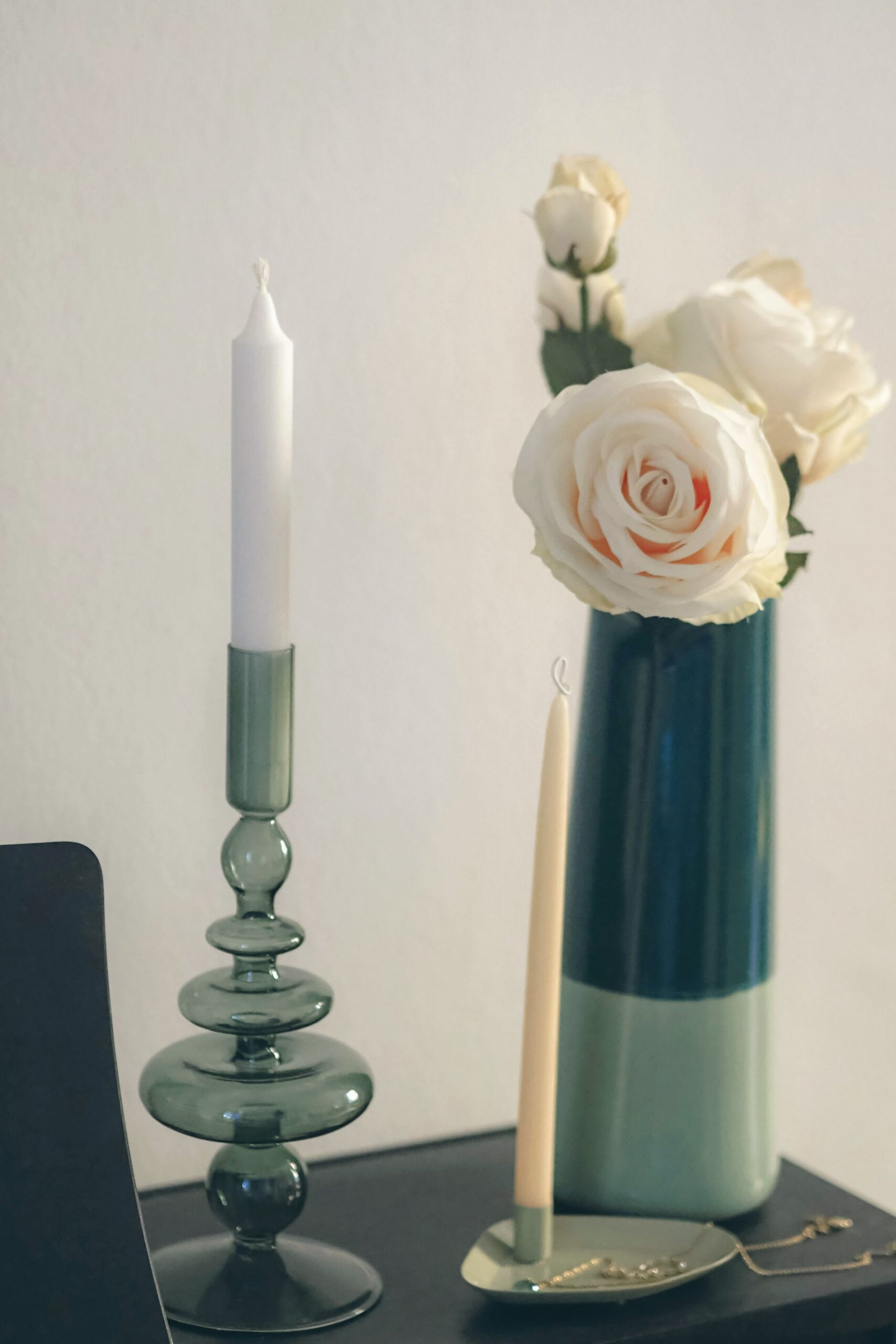 Sea-glass green candlestick and white roses
