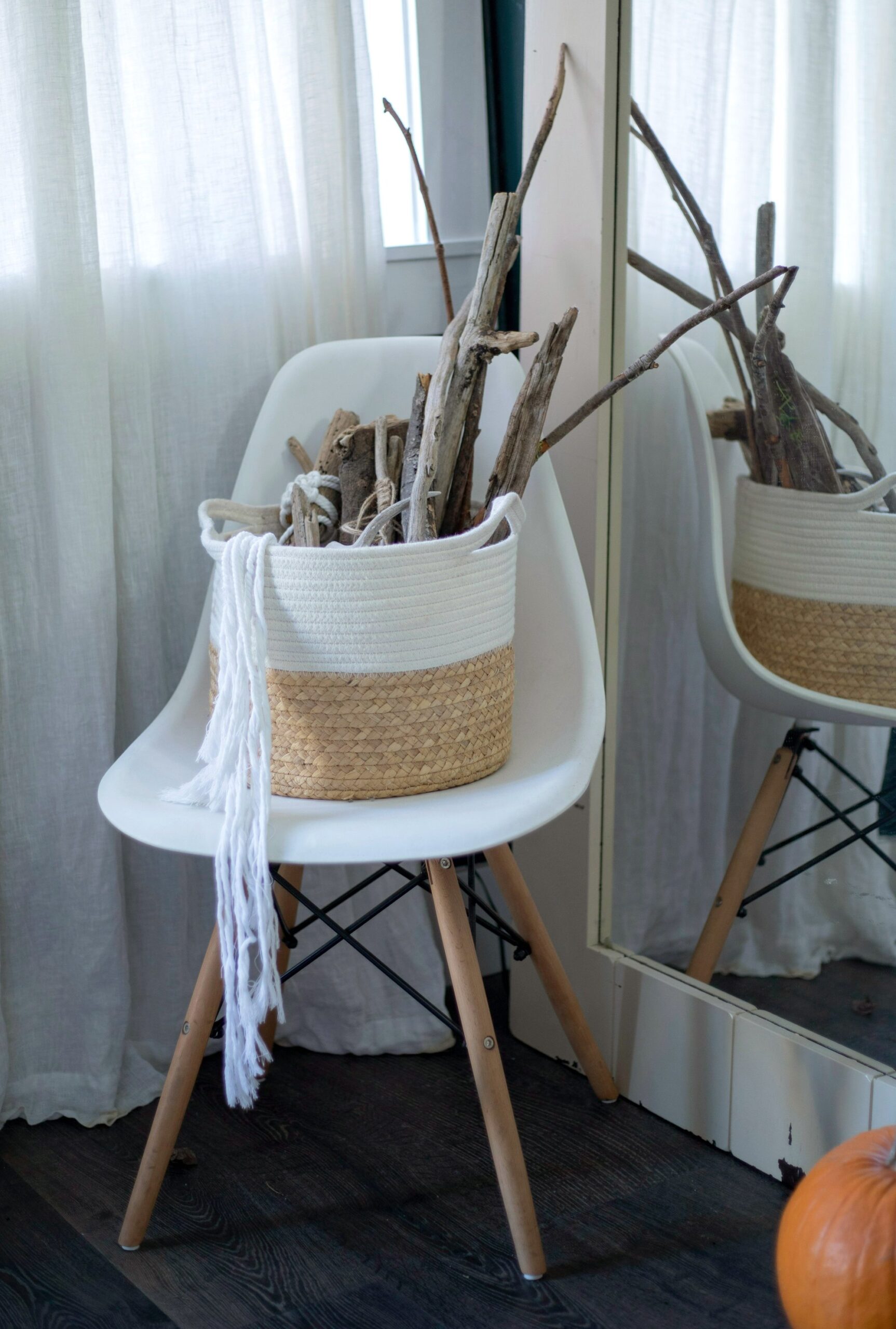 Woven rope basket on a white chair