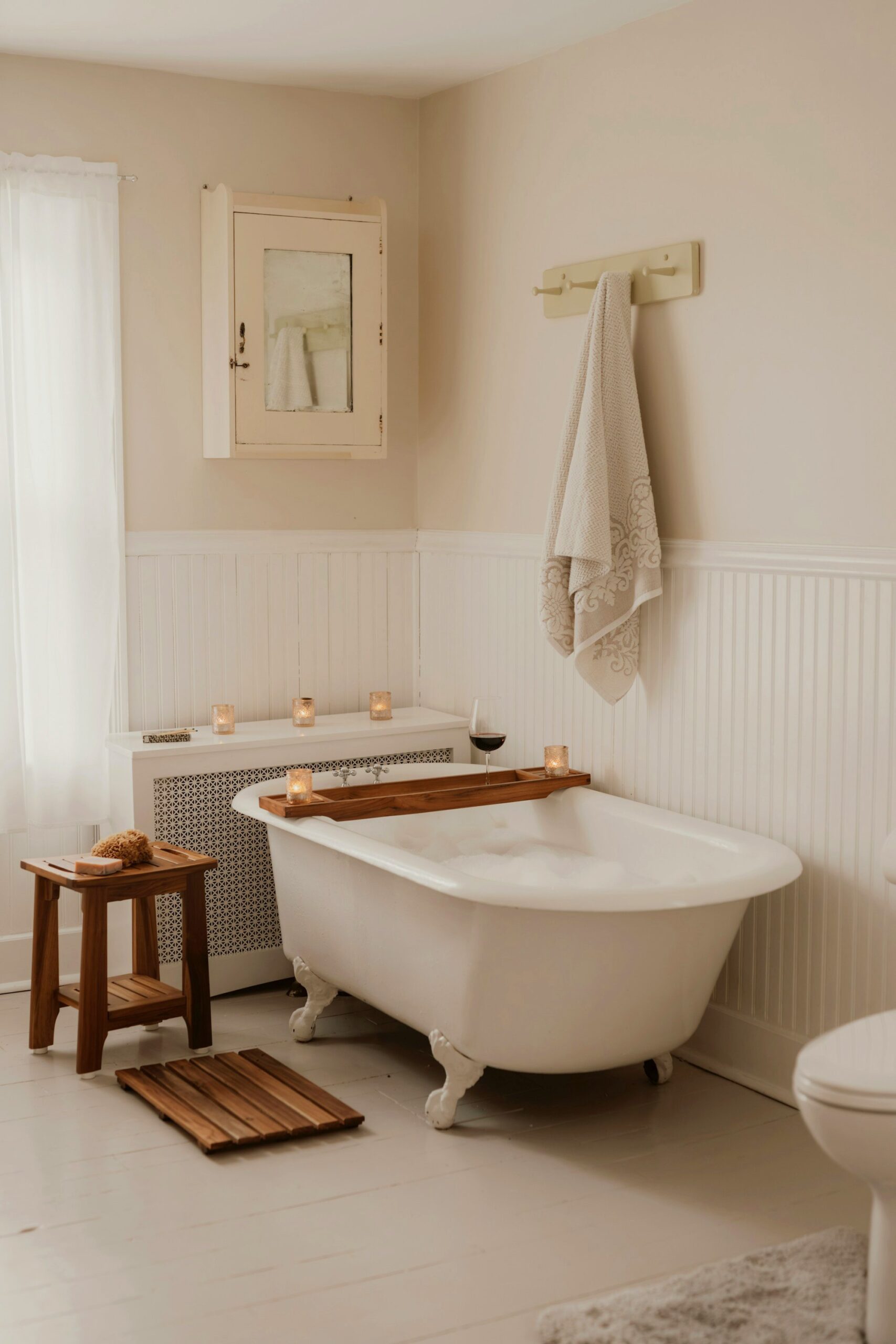 Bright white bathroom with a freestanding tub